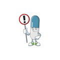 A picture of vitamin pills cartoon character concept holding a sign