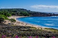 Tourist sun bathing in a beautiful beach of Lanai island in Hawaii