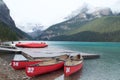 Canoes by the boat house on Lake Louise Royalty Free Stock Photo