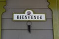 Picture of welcome sign bienvenue in french on a door with old keys hanging. Royalty Free Stock Photo