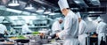 A Picture Of A Wellequipped, Highend Commercial Kitchen With Professional Chefs At Work Royalty Free Stock Photo