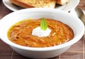 A picture of a white bowl full of fresh tomatoes soup Royalty Free Stock Photo