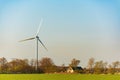 Wind turbines on the beautiful autumn meadow