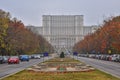 Parliament house and Unirii boulevard in Bucharest dressed in autumn vibrant colors, prepare for Christmas Market. Royalty Free Stock Photo