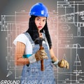 Construction woman with tools, denims overall Royalty Free Stock Photo