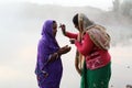 Giving Tilak on the Occasion of Chhath Puja