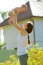 Picture of woman holding baby on arms Royalty Free Stock Photo