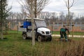 Picture of a worker caring for trees