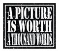 A PICTURE IS WORTH A THOUSAND WORDS, text written on black stamp sign