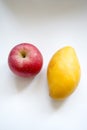 Yellow mango and red apple Royalty Free Stock Photo