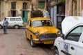 Picture of a yellow taxi parking at vintage lane streets in North Kolkata, India on October 2020 Royalty Free Stock Photo
