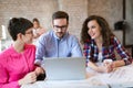 Picture of young architects discussing in office