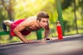 Picture of a young athletic man doing push ups Royalty Free Stock Photo