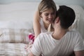 Picture of young attractive couple kissing on bed Royalty Free Stock Photo