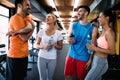 Picture of cheerful fitness team in gym