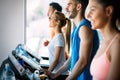 Picture of cheerful fitness team in gym