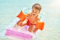 Picture of young happy boy swimming on mattress on Red Sea Royalty Free Stock Photo