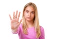Picture of young lovely girl making stop gesture.Isolated