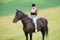 Picture of young pretty girl riding horse Royalty Free Stock Photo