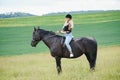 Picture of young pretty girl riding horse Royalty Free Stock Photo