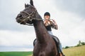 Picture of young pretty girl riding horse Royalty Free Stock Photo