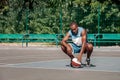 Picture of young resting african basketball player