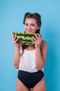 Picture of young woman holding a big slice watermelon Royalty Free Stock Photo