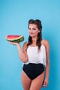 Picture of young woman holding a big slice watermelon Royalty Free Stock Photo