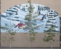 `Snowboarders` by Mason Torry on the outside of a business in a shopping mall in Avon, Colorado.