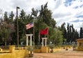 American and Moroccan flags flying at the Domaine De La Zouina Winery near Meknes, Morocco.