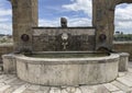 Ancient fountain of the seven spouts and arches in Pitigliano, Tuscany, Italy. Royalty Free Stock Photo