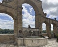 Ancient fountain of the seven spouts and arches in Pitigliano, Tuscany, Italy. Royalty Free Stock Photo