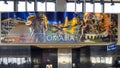 Art piece in Eppley Aiport in Omaha Nebraska featuring many cultural icons of Omaha.