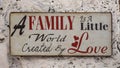 Artistic definition of family displayed on the wall of a restaurant in Portugal. Royalty Free Stock Photo