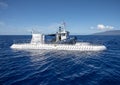 Atlantis IV submarine and submarine support vessel `Roxie` in the Pacific Ocean off the Island of Maui in Hawaii.