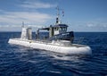 Atlantis IV submarine and submarine support vessel `Roxie` in the Pacific Ocean off the Island of Maui in Hawaii. Royalty Free Stock Photo