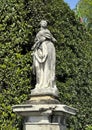 Aurora, one of 12 statues of mythical divinities and allegorical figures on the front of the Italian garden of Villa Carlotta. Royalty Free Stock Photo