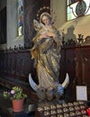 The baroque carved polychrome statue of the Immaculate in the Church of Saint Martha in Menaggio.