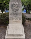 Base of a concrete statue of a heroic female figure by Jose Martin known as the `Founder`s Statue` in Fair Park in Dallas, Texas.