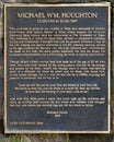 Information plaque on the bronze memorial sculpture of Michael William Houghton along the Tulsa River Trail in Tulsa, Oklahoma.