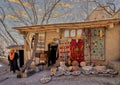 Berber man outside his store selling authentic Moroccan made products outside the Kasbah du Toubkal in Morocco.