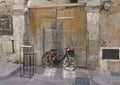 Old Black bicycle turned into a flower display in Matera, Italy