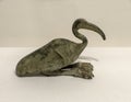 Bronze Egyptian ibis amulet from the Late Period 712-332 BCE on display in the Dallas Museum of Art. Royalty Free Stock Photo