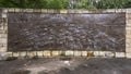 The Shawnee Trail, a bronze relief mural by Anita Pauwels, part of a public art installation titled `Cattle Drive` in Central Park