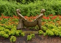 Bronze sculpture of a boy and girl holding a basket by Gary Price at the Dallas Arboretum and Botanical Garden Royalty Free Stock Photo