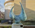 `Requiem`, a bronze sculpture on a concrete base by Erwin Binder on the campus of the University of Michigan in Ann Arbor.