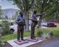 `Sidewalk Society, Contractor and Architect`, a bronze sculpture by Glenna Goodacre in Avon, Colorado. Royalty Free Stock Photo