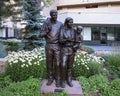 `Sidewalk Society, Family`, a bronze sculpture by Glenna Goodacre in Avon, Colorado. Royalty Free Stock Photo