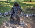 Bronze sculpture titled Crossing the Prairie by Glenna Goodacre along the Tulsa River Trail in Oklahoma.