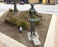 Bronze sculpture titled \'Innocence\' by David Pearson in downtown Edmond, Oklahoma.